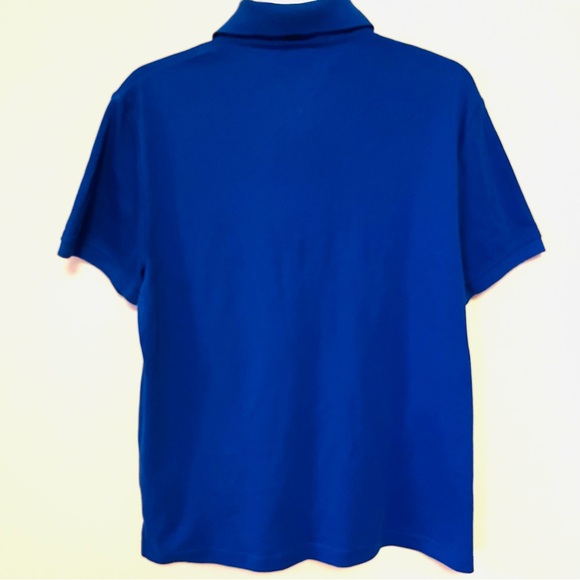 NWT Tommy Hilfiger short sleeve blue polo shirt. Size Medium. 100% Cotton. New - Picture 5 of 5
